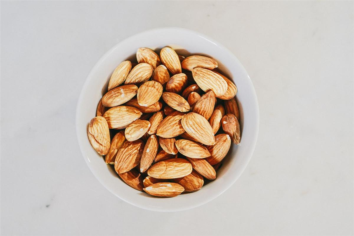 Almonds in a white bowl